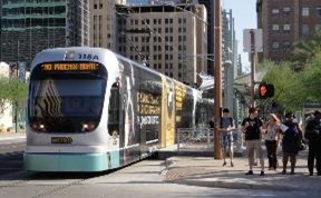 street-running light rail transit train powered by overhead lines